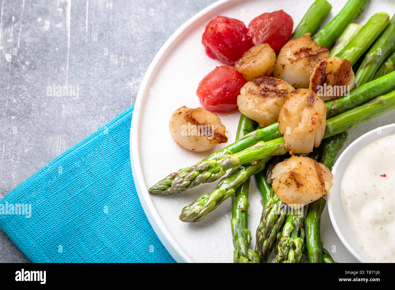 Grilled scallops with asparagus Stock Photo Alamy