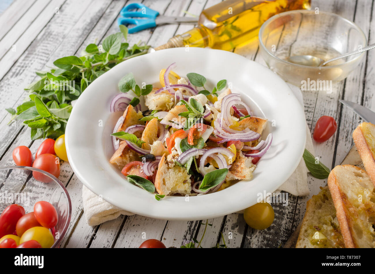 Delicious salad with fresh vegetable, crispy croutons and cheese Stock Photo