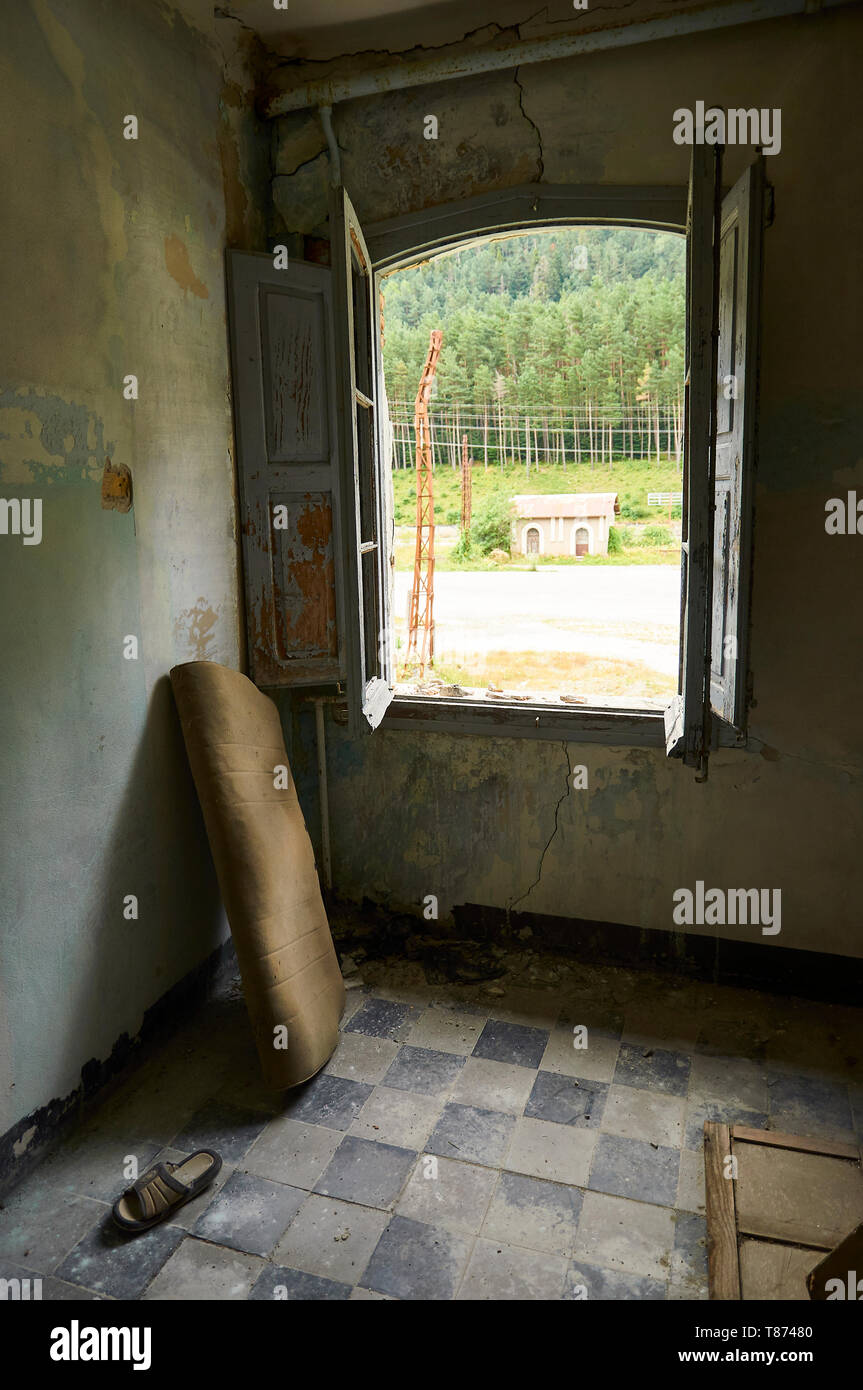 Interior of a room in the ruined facilities at the abandoned Canfranc International railway station (Canfranc, Pyrenees, Huesca, Aragon, Spain) Stock Photo