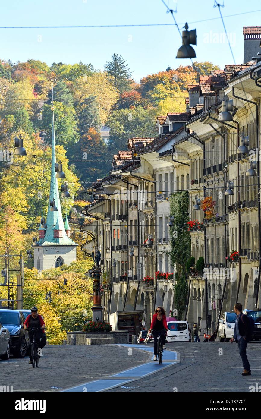 Switzerland, Canton of Berne, Berne, old town listed as World Heritage by UNESCO, Gerechtigkeitsgasse street and Nydeggkirche church bell tower Stock Photo