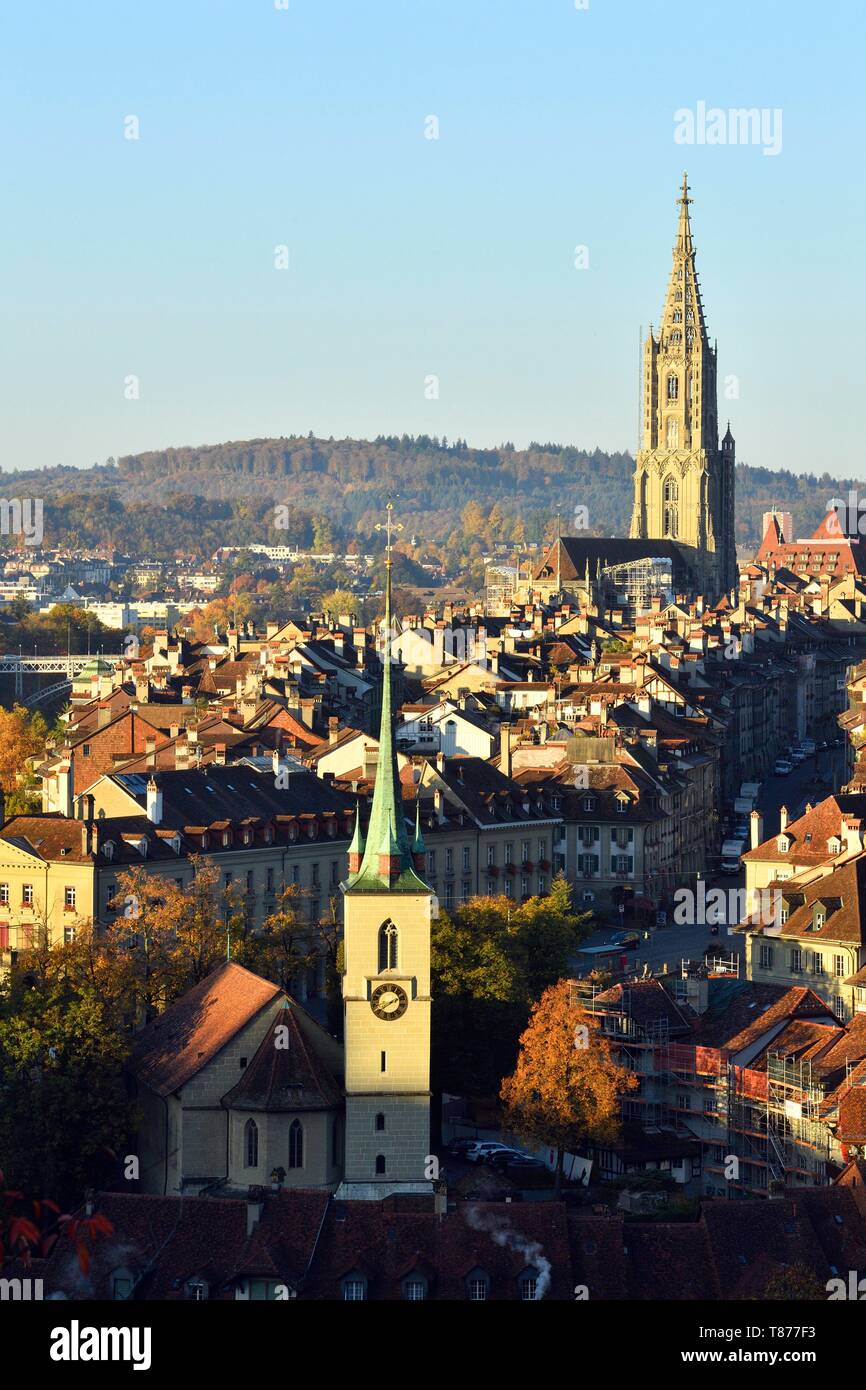 Switzerland, canton of Berne, Berne, general view of the old town listed as World Heritage by UNESCO, the St. Vincent (Munster) cathedral and Nydeggkirche church bell tower Stock Photo