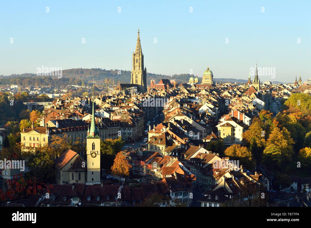 Switzerland, canton of Berne, Berne, general view of the old town listed as World Heritage by UNESCO, the St. Vincent (Munster) cathedral and Nydeggkirche church bell tower Stock Photo