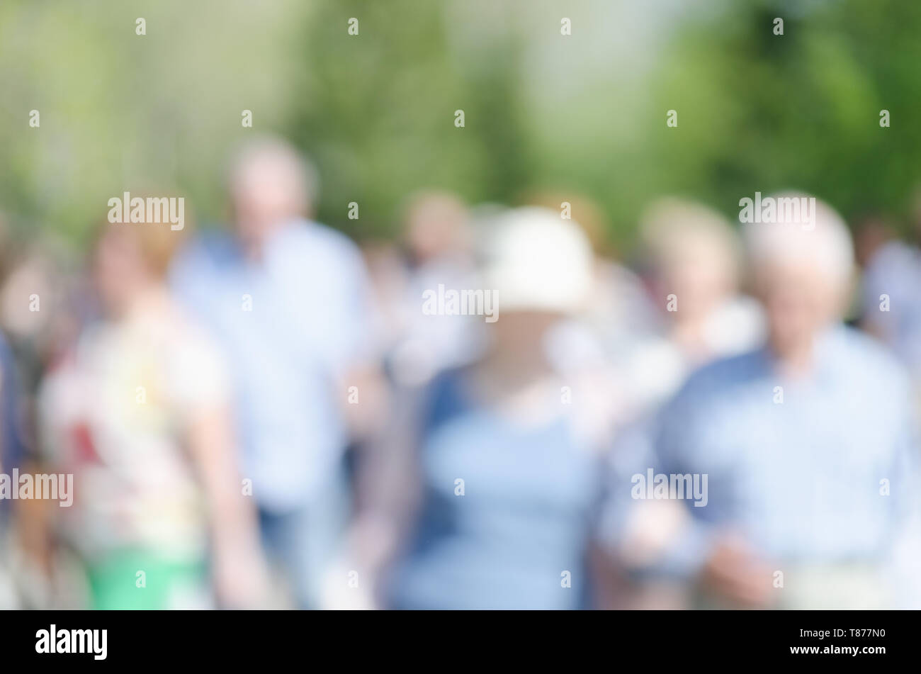Blurred people walking down the street with sunlight Stock Photo - Alamy