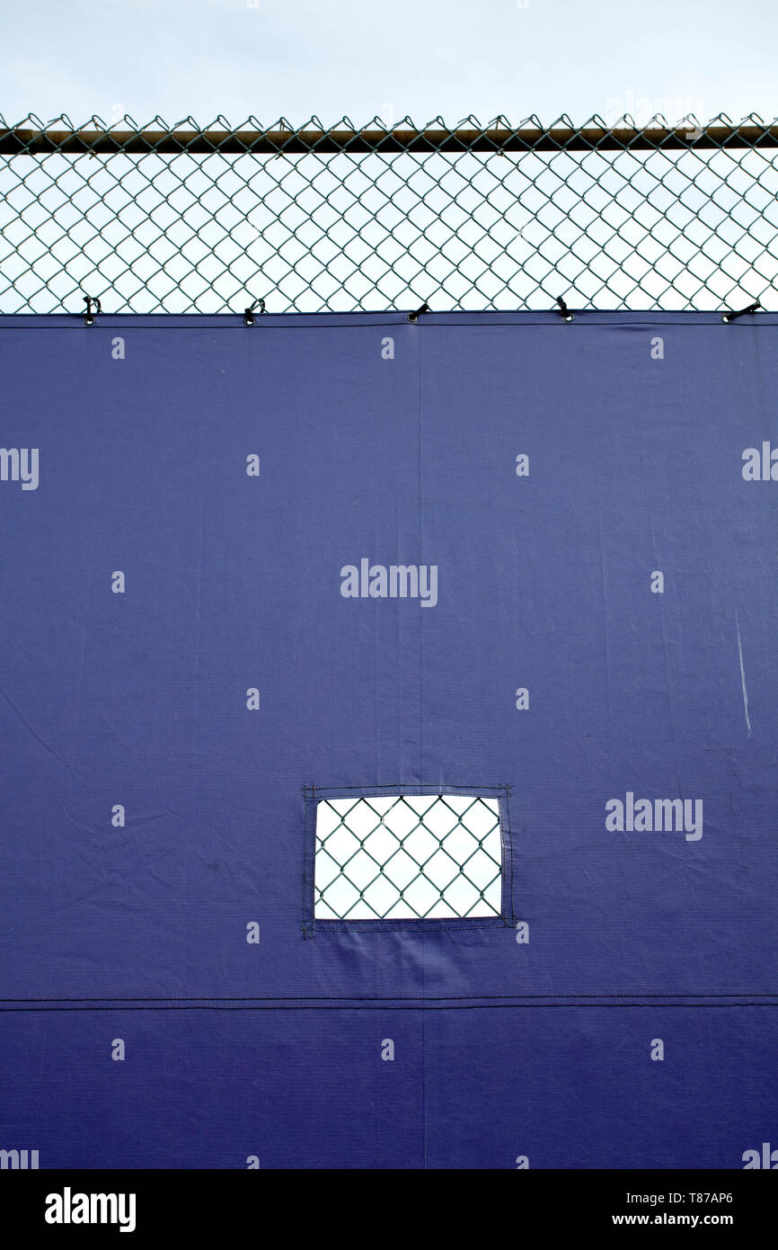 Tarp Covering Chain Link Fence Stock Photo Alamy