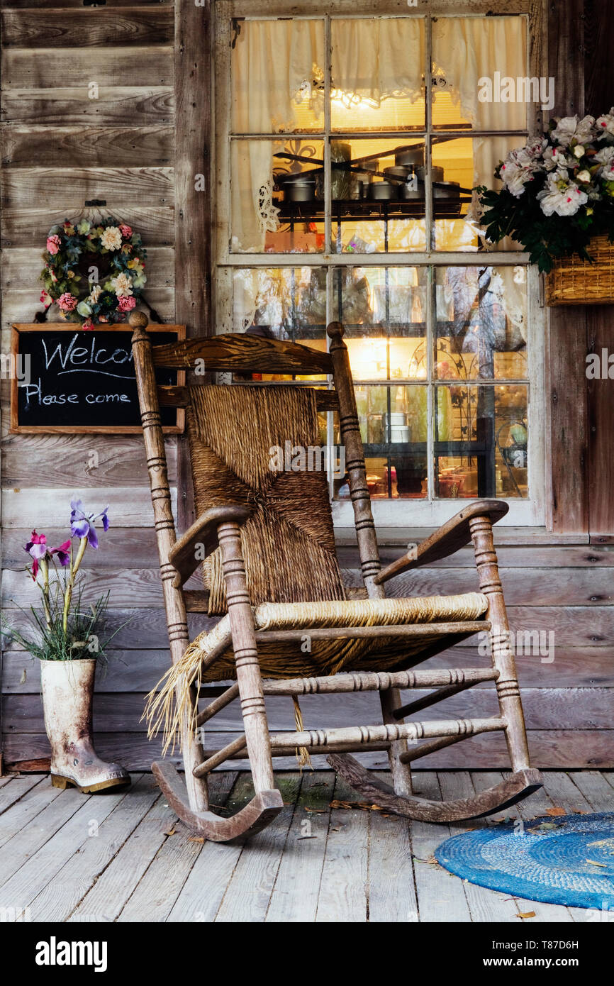 Old Wooden Rocking Chair On A Wooden Porch Stock Photo Alamy