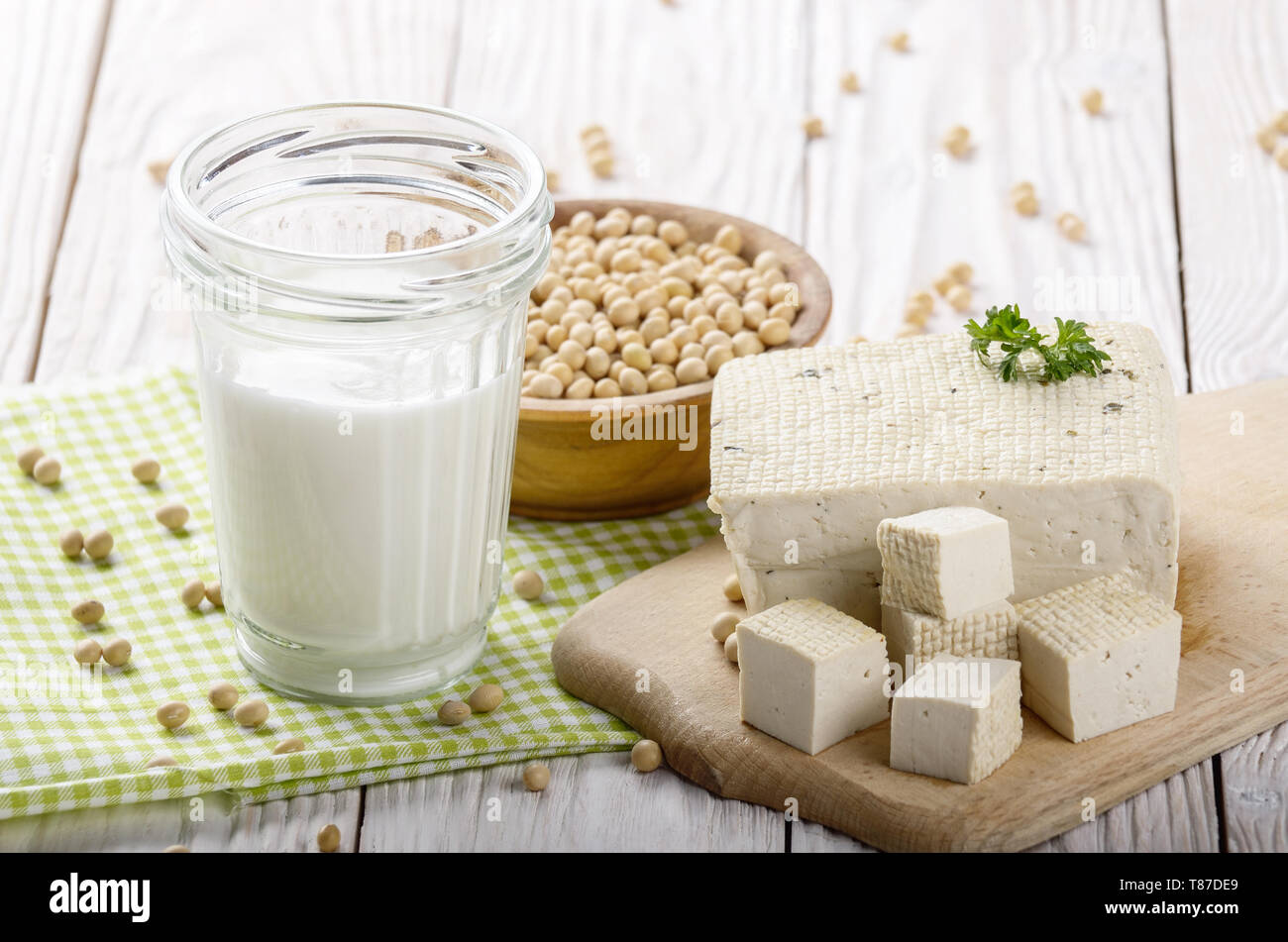 Nondairy alternatives Soy milk or yogurt in mason jar and tofu on