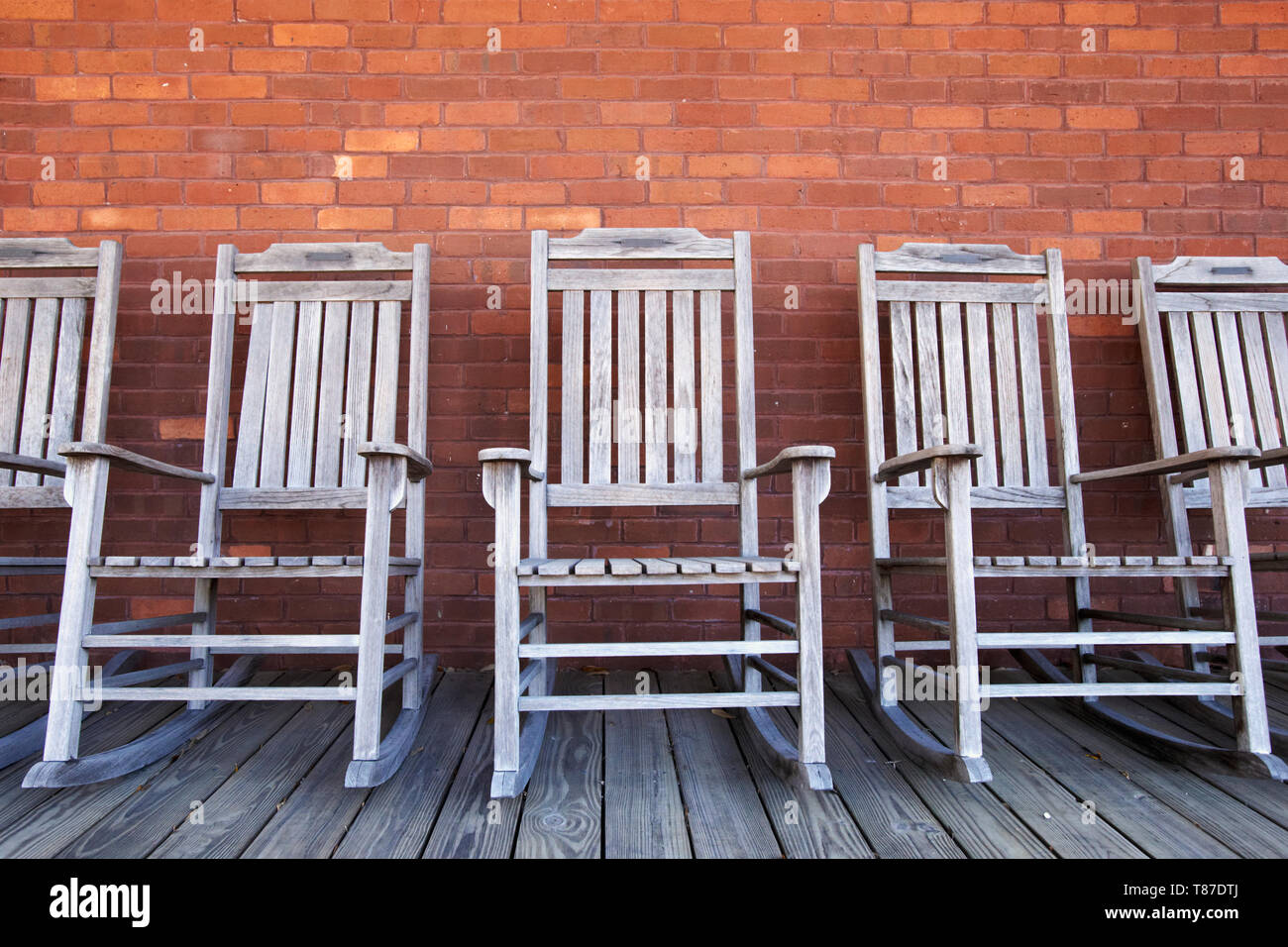 Row of rocking chairs hi-res stock photography and images - Alamy