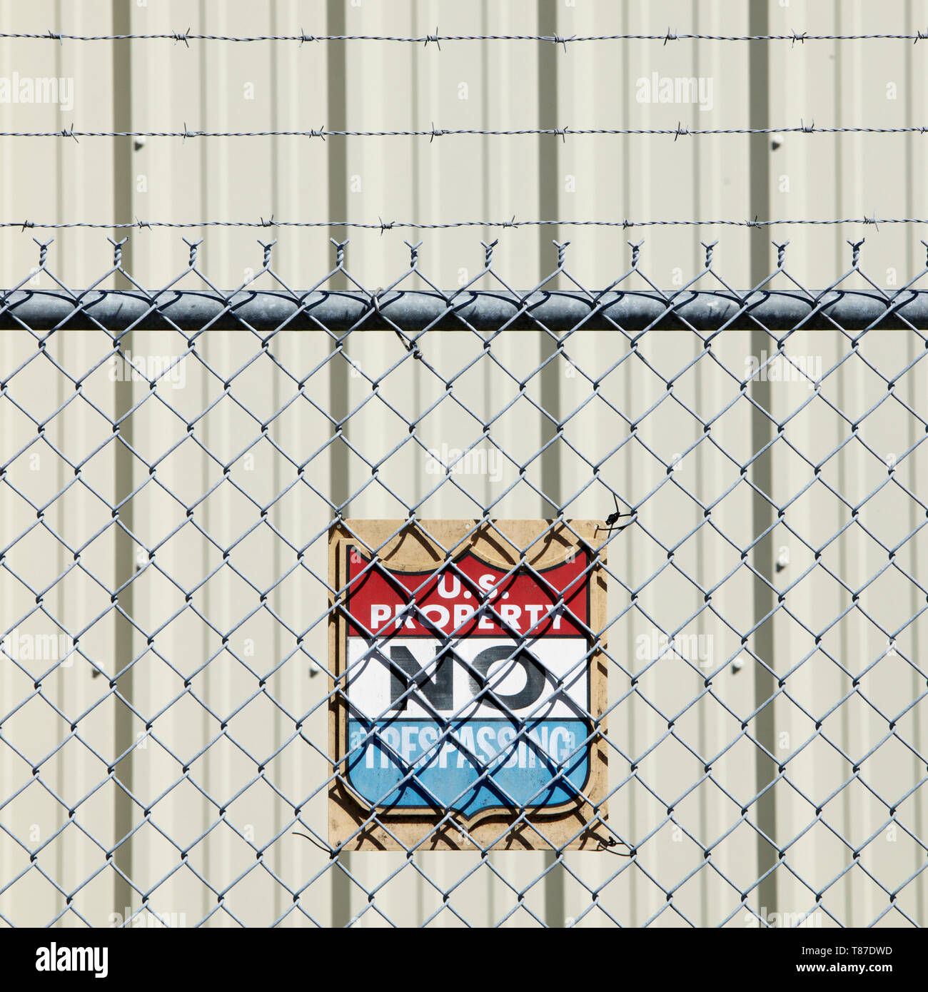 Warning Sign and Fence Stock Photo