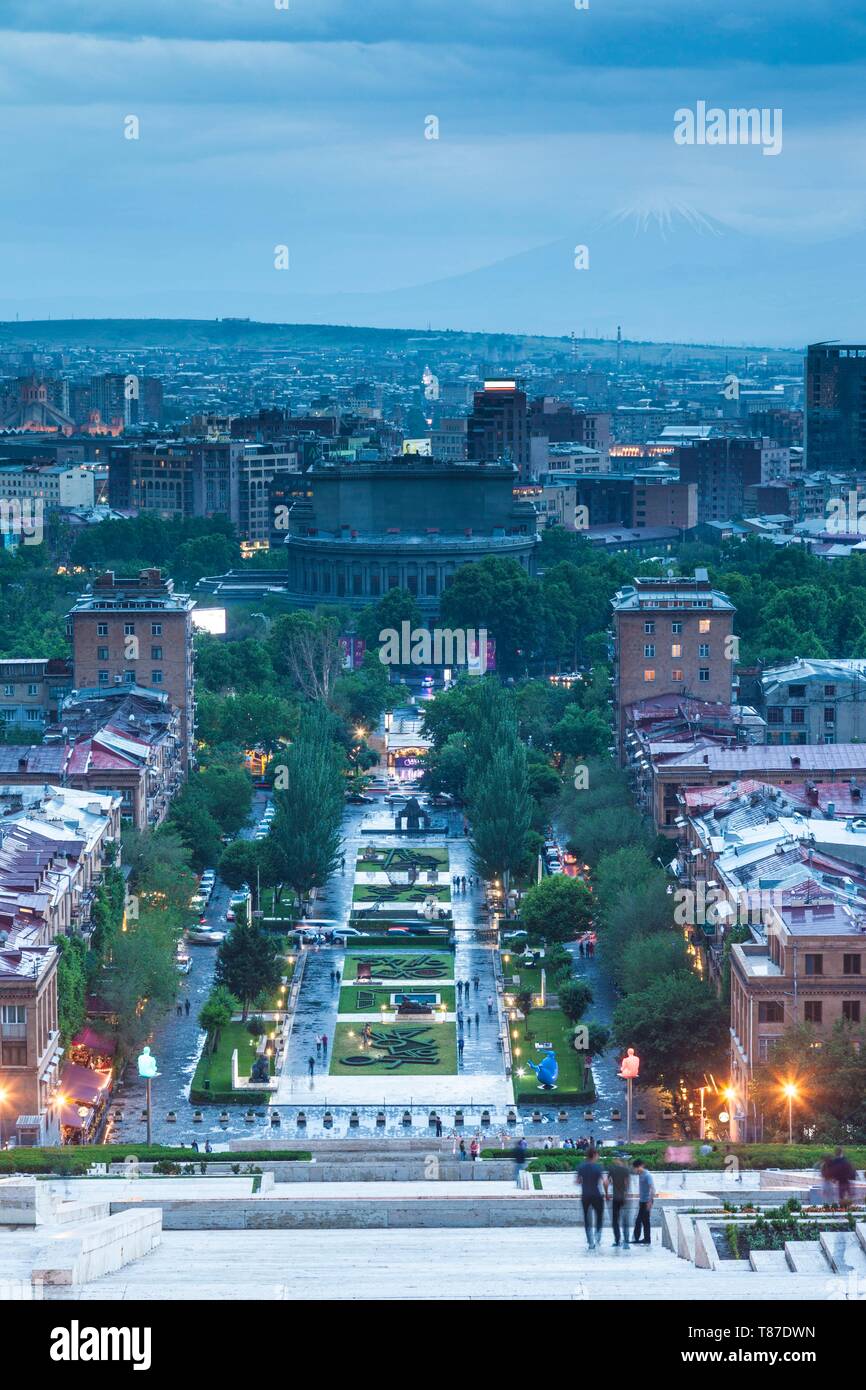 Armenia, Yerevan, The Cascade, high angle view of the city and Yerevan Opera Theater, dusk Stock Photo