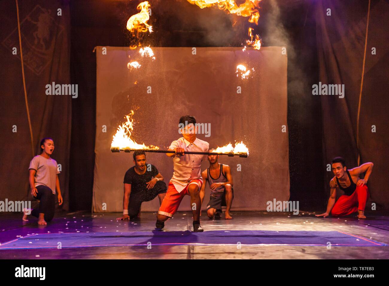 Cambodia, Battambang, Phar Ponleu Selpak, arts and circus school, juggler with flaming torch during circus performance Stock Photo