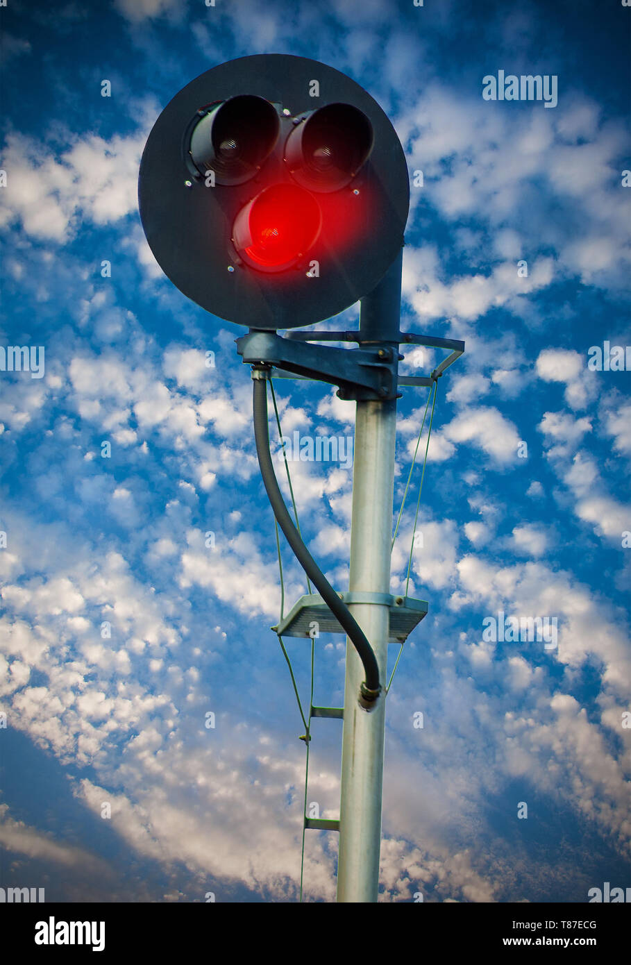 Flashing lights of track and road signals Stock Photo