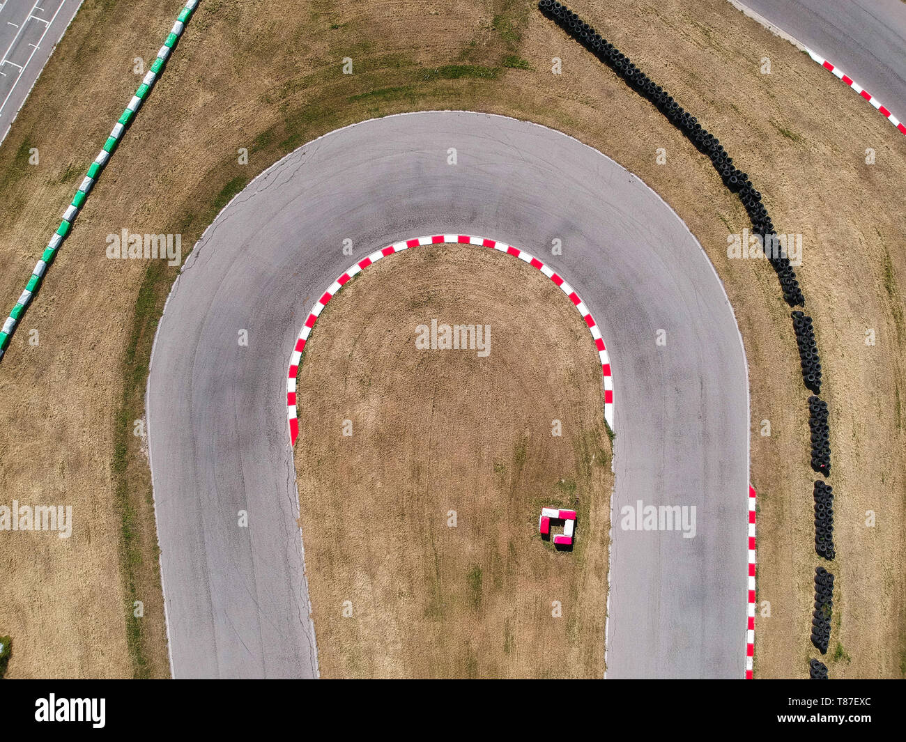 Curves on karting race track, aerial view background. Stock Photo