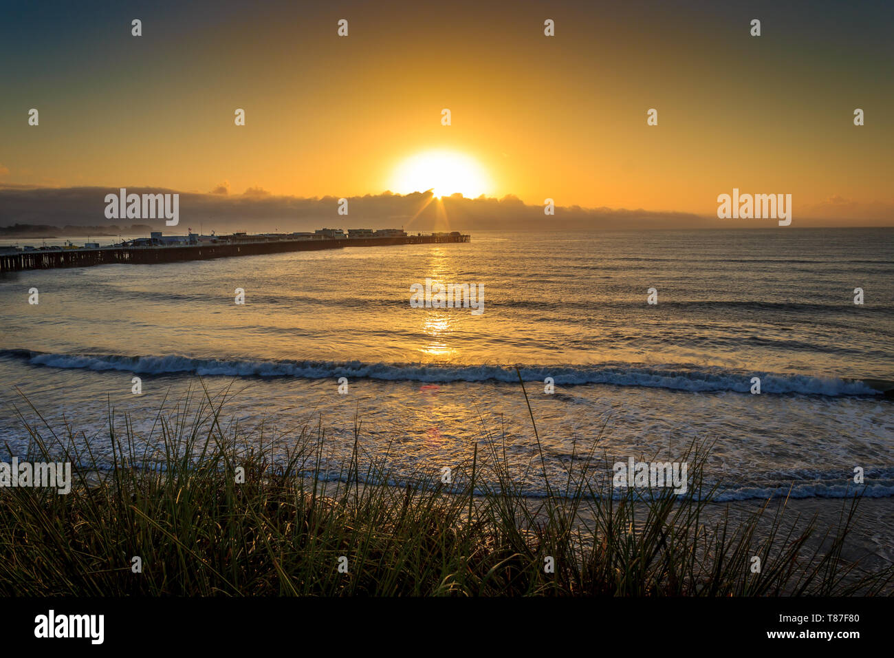 Sunrise over the Santa Cruz Wharf, Santa Cruz, California, USA Stock Photo