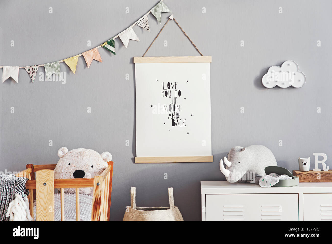 Stylish and modern scandinavian nursery interior with gray walls, brown ...