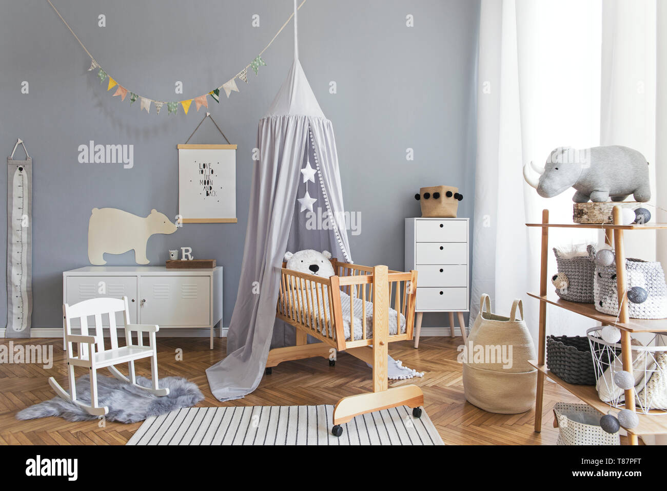 nursery with gray furniture
