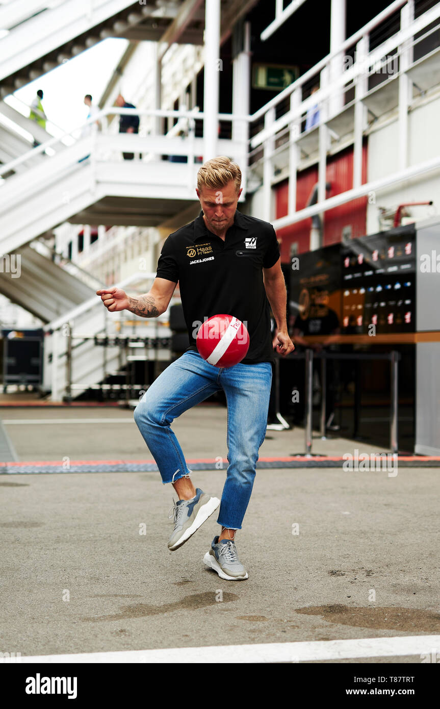 Barcelona, Spain. 11 May, 2019. Kevin Magnussen of the Haas Team plays  football at the paddock