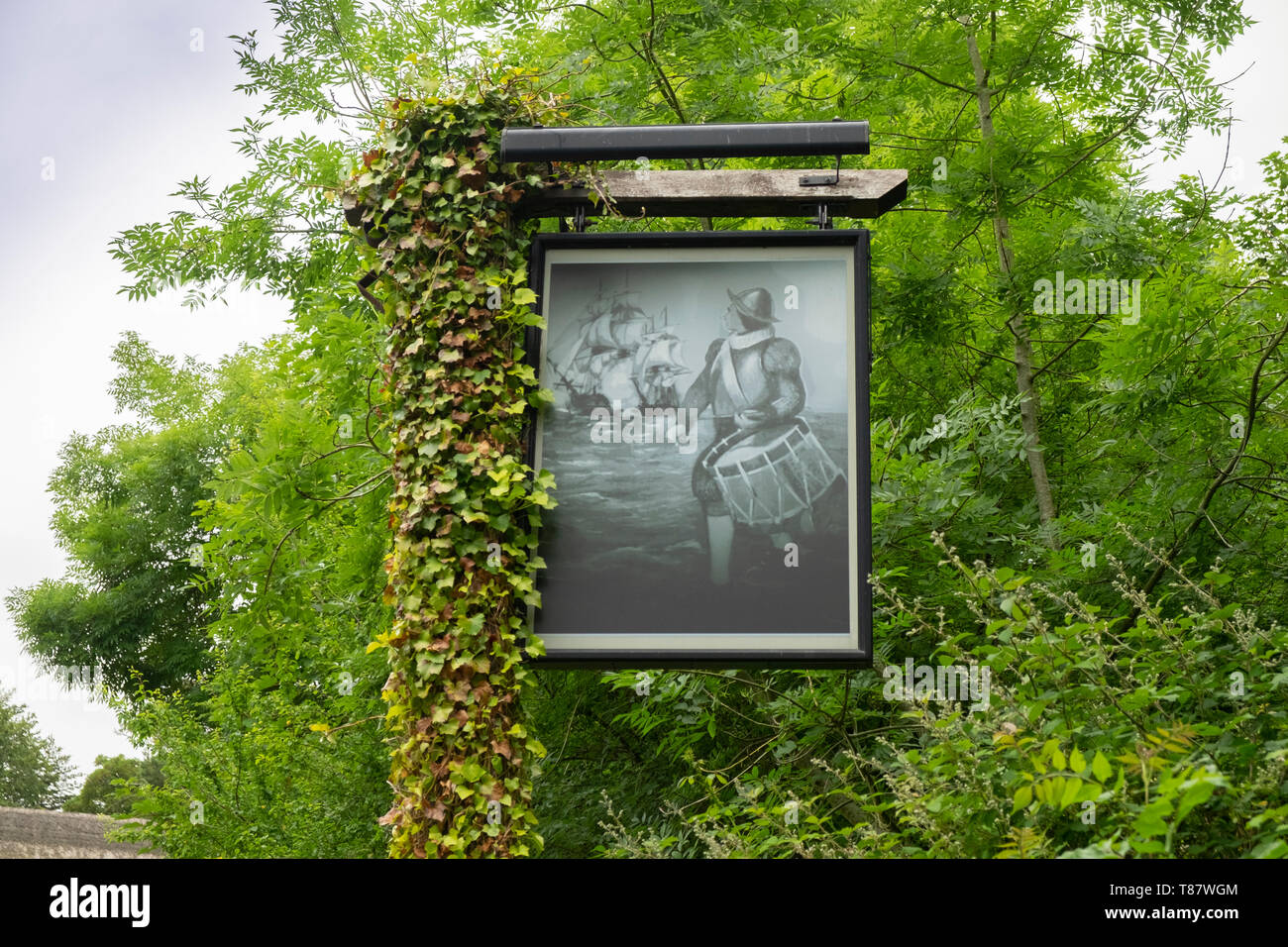 The name sign of a famous old country inn The Drum Inn, Cockington