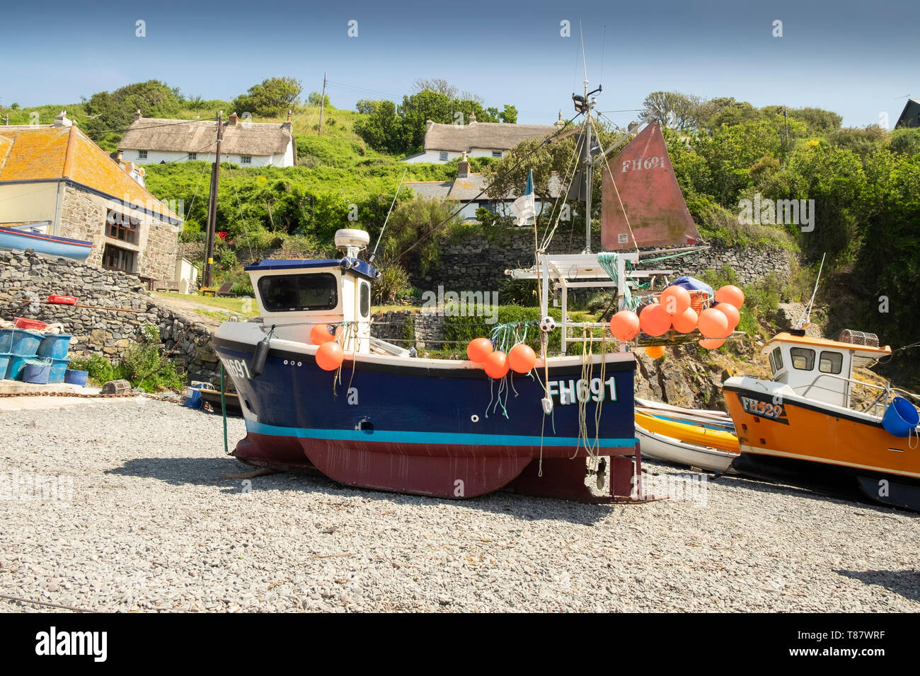 Traditional fishing boat on the beach of the small fishing village of