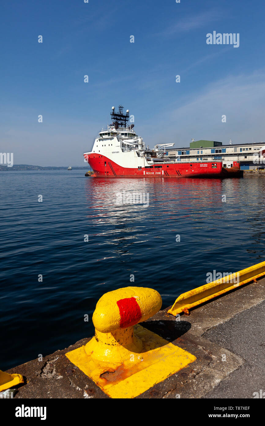 Offshore AHTS anchor handling tug supply vessel Siem Ruby in the port of Bergen, Norway. Skoltegrunnskaien terminal. Stock Photo