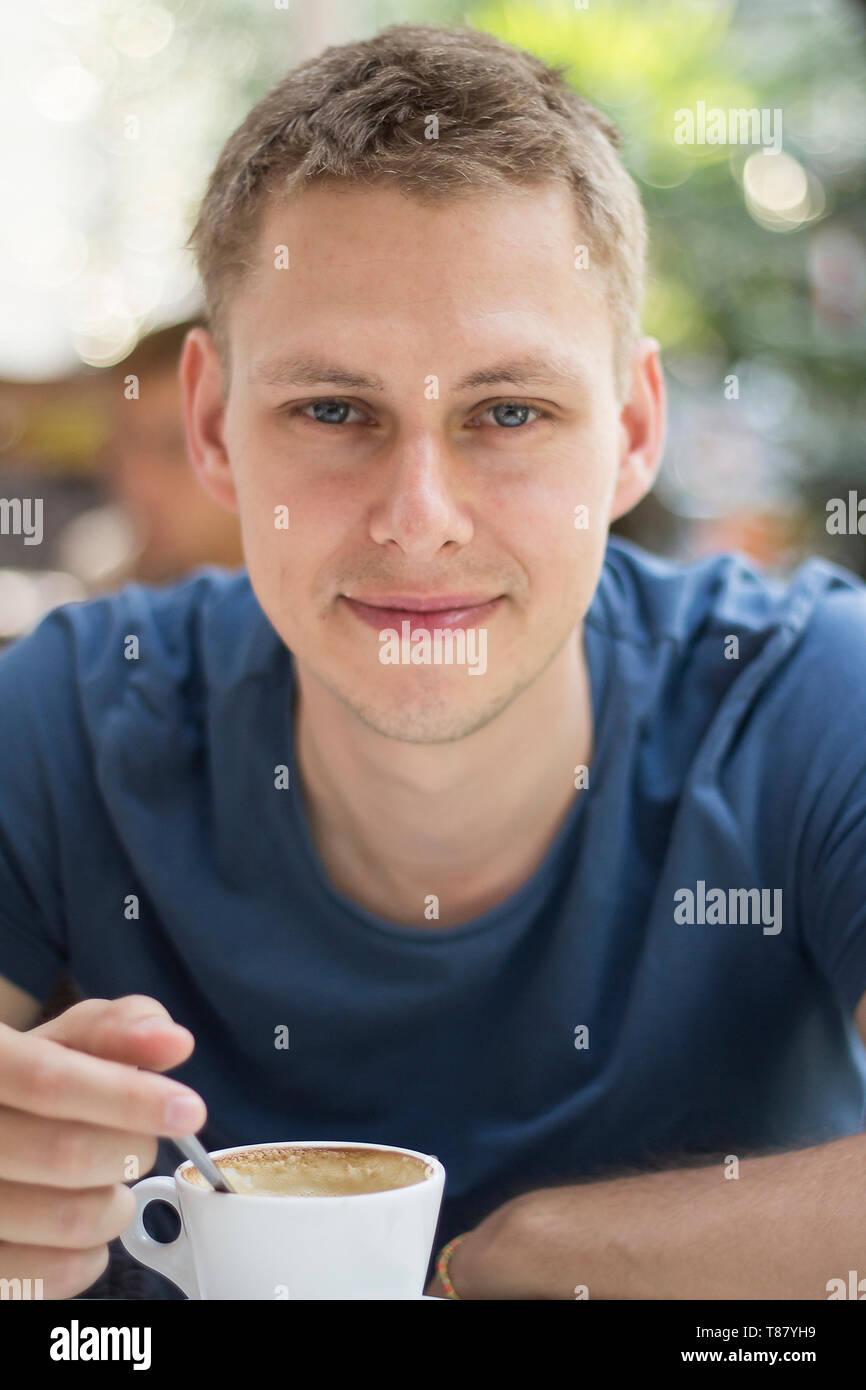 young man drinking coffee Stock Photo