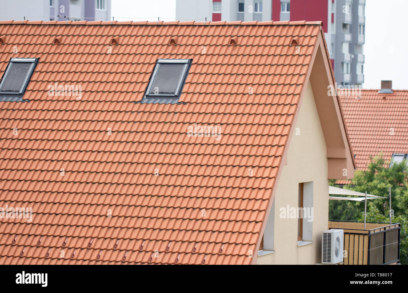 red tile roof on residential house Stock Photo