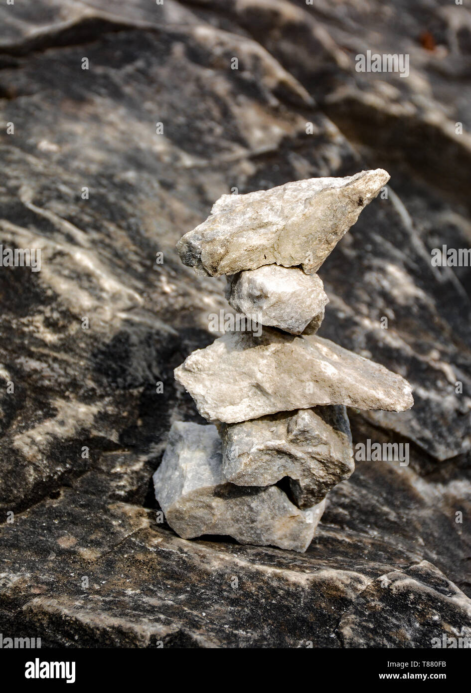 Stone pyramids built by tourists from pieces of marble in the mountain Park Ruskeala. Stock Photo