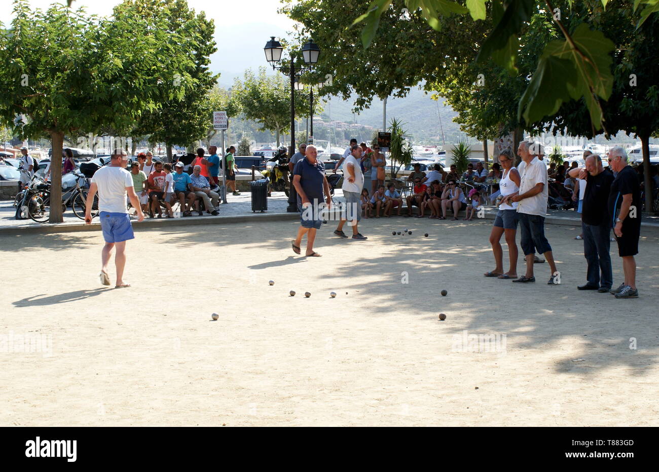 Playing the game of boules, St Florent, Corsica, France Stock Photo