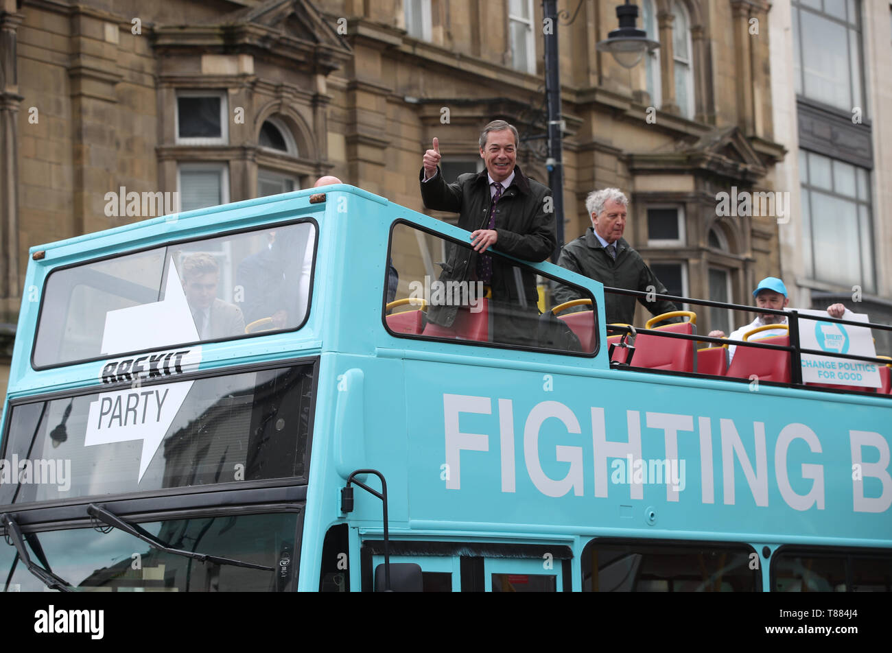 Brexit Party leader Nigel Farage on an open topped bus while on the European Election campaign trail in Sunderland. Stock Photo
