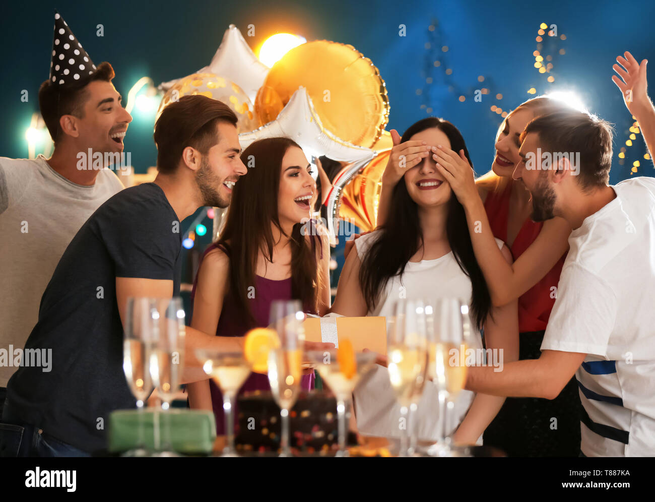 Young people at birthday party in club Stock Photo - Alamy