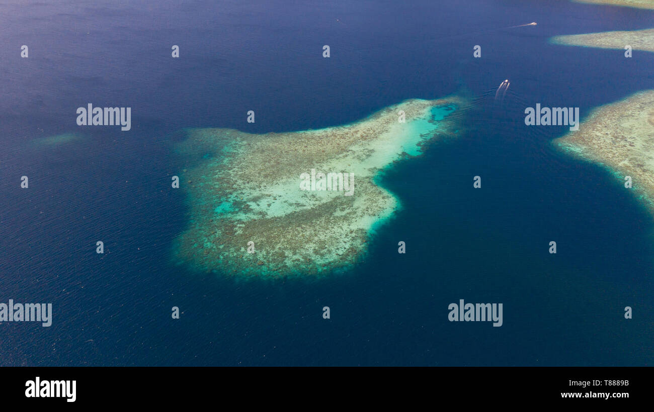 Coral reefs and blue sea, view from above. Philippine nature aerial ...