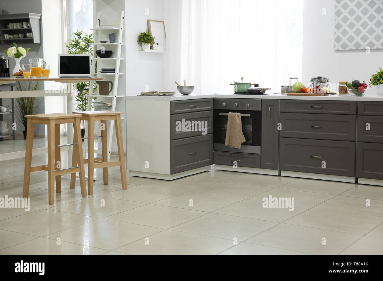 Interior of modern kitchen with stylish furniture Stock Photo - Alamy