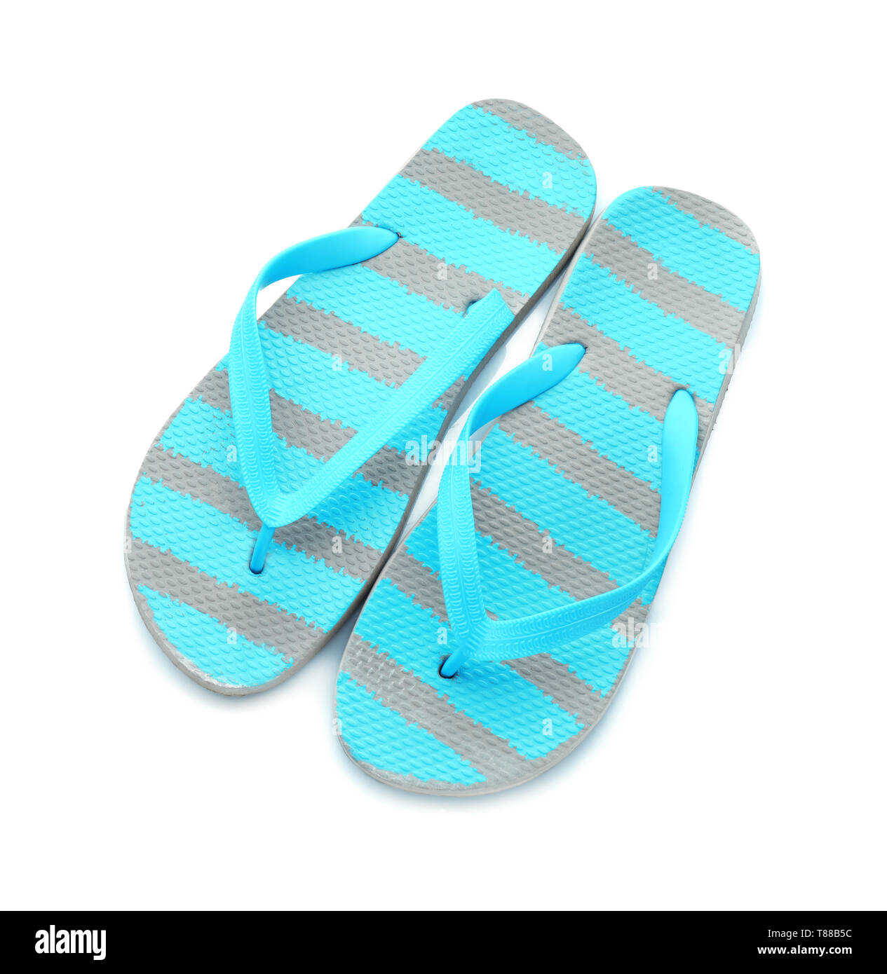 Female beach flip-flops on white background Stock Photo - Alamy