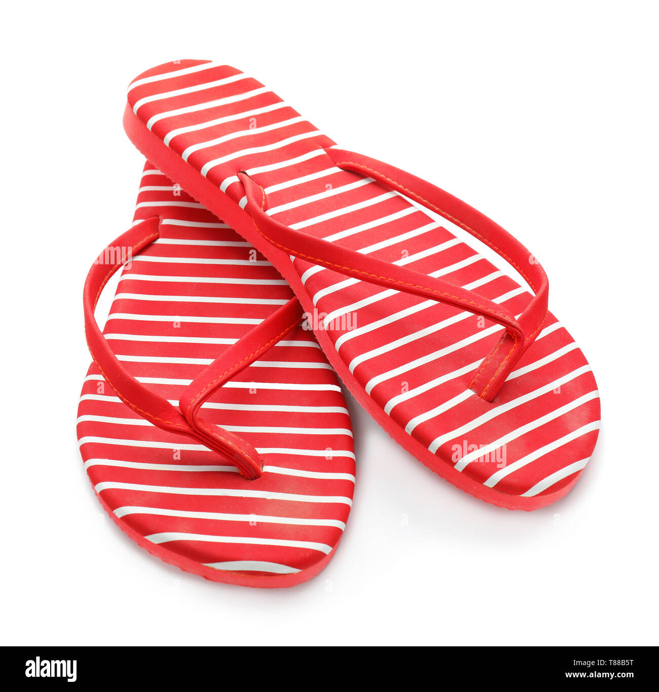 Female beach flip-flops on white background Stock Photo - Alamy