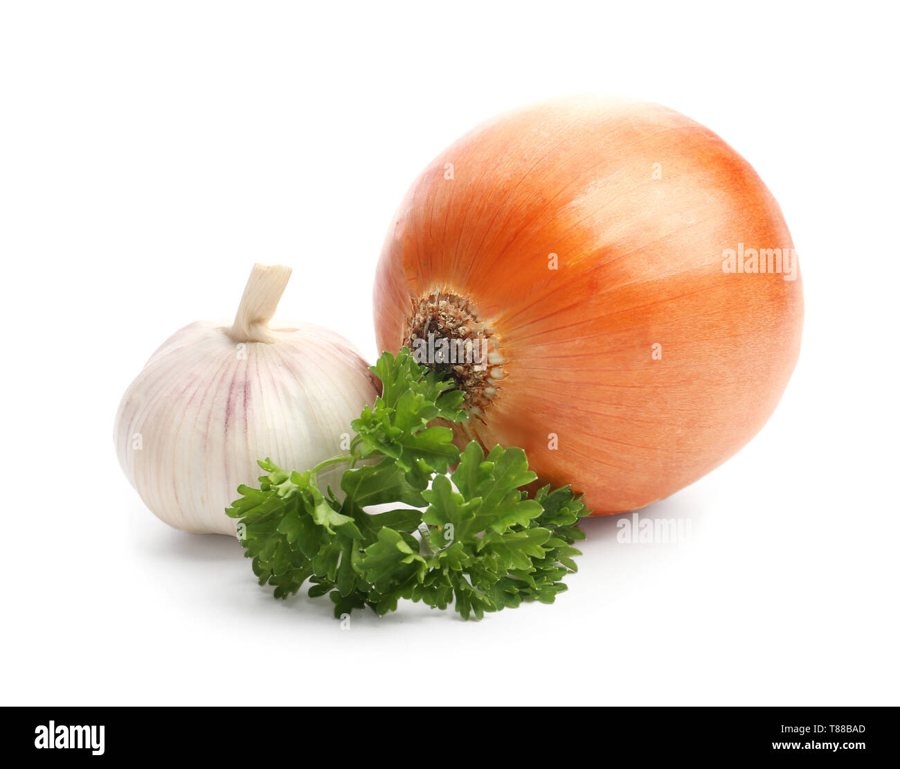 Garlic and onion with fresh parsley on white background Stock Photo - Alamy