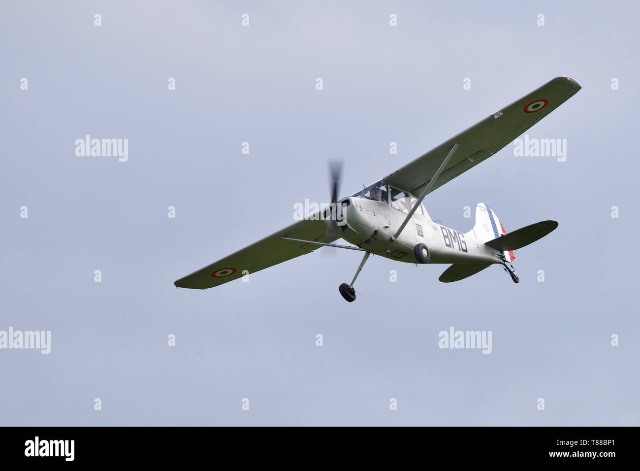 1957 Cessna 305C Bird Dog "G-JDOG" performing at the season premiere at Old Warden on the 5th May 2019 Stock Photo