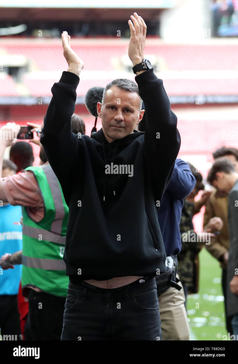 Salford City co-owner Ryan Giggs celebrates after his side wins the Vanarama National League Play-off Final at Wembley Stadium, London. Stock Photo