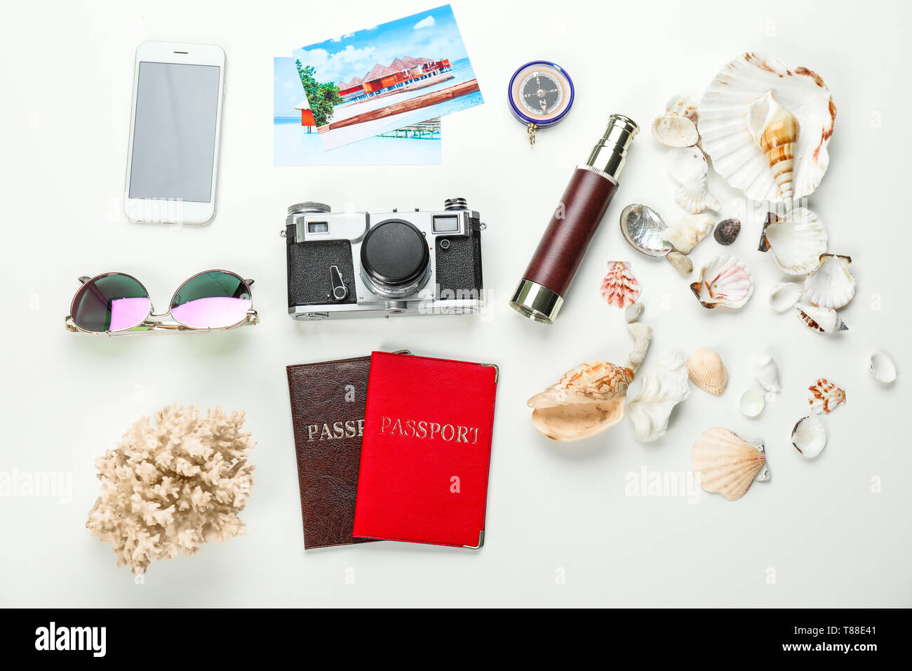 Composition with passports, smartphone and travel objects on white background Stock Photo