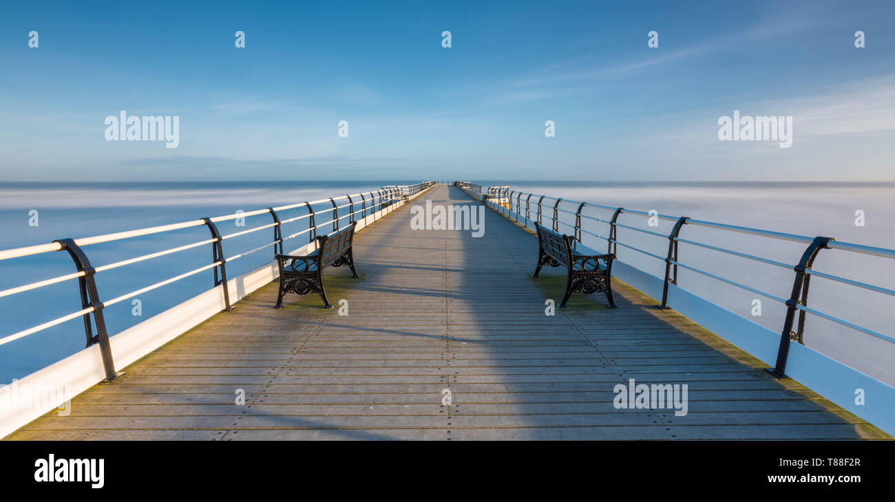 An early start and a quick run down the motorway to catch the sunrise at Saltburn-by-the-Sea and the wonderfully restored Victorian Pier. Stock Photo