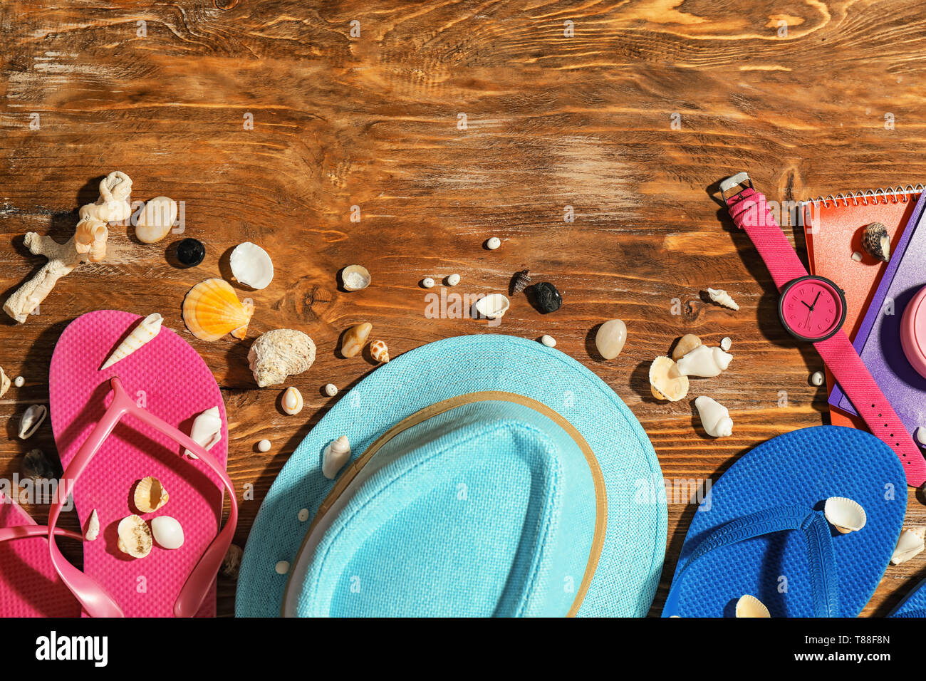 Composition with beach items on wooden background Stock Photo