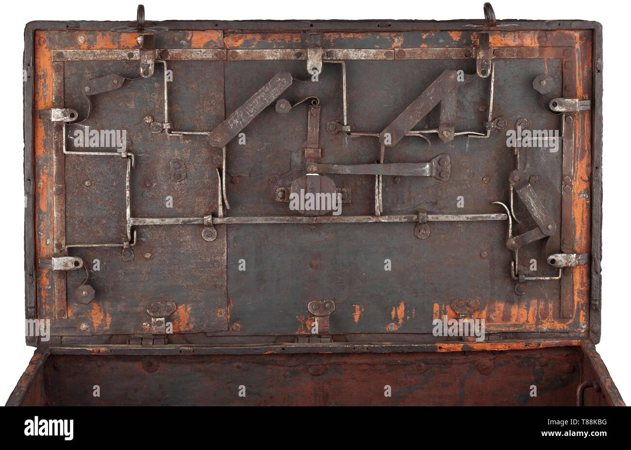 A German strong-box, circa 1700 Rectangular body of sheet iron with riveted band fittings. False lock with florally chased escutcheon and two hasps at front. Hinged lid with central keyhole, original key and five latches. Cover plate missing. Two movable side handles. Size 84 x 48 x 48 cm. historic, historical, 18th century, Additional-Rights-Clearance-Info-Not-Available Stock Photo