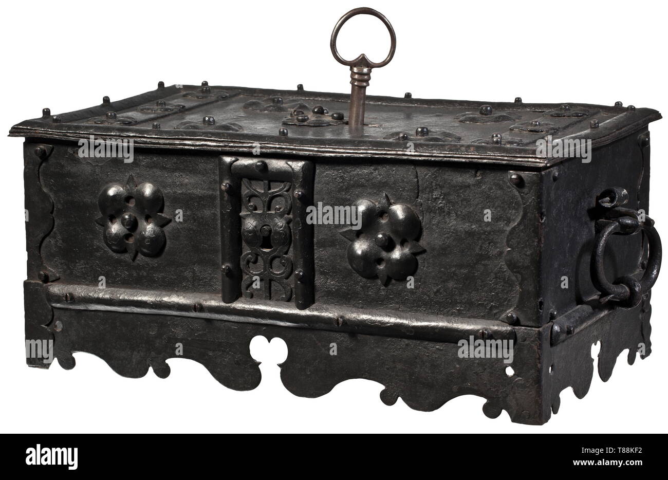 A German iron casket, 2nd half of the 17th century Body of sheet iron with curved base, the edges reinforced with riveted bands and decorated with likewise riveted chased rosettes. False lock with openwork escutcheon at front. Hinged lid with central keyhole, original(?) key and four latches. Inside drawer on the lower left. Two movable side handles. Size 36 x 23 x 16 cm. historic, historical, handicrafts, handcraft, craft, object, objects, stills, clipping, clippings, cut out, cut-out, cut-outs, 17th century, Additional-Rights-Clearance-Info-Not-Available Stock Photo