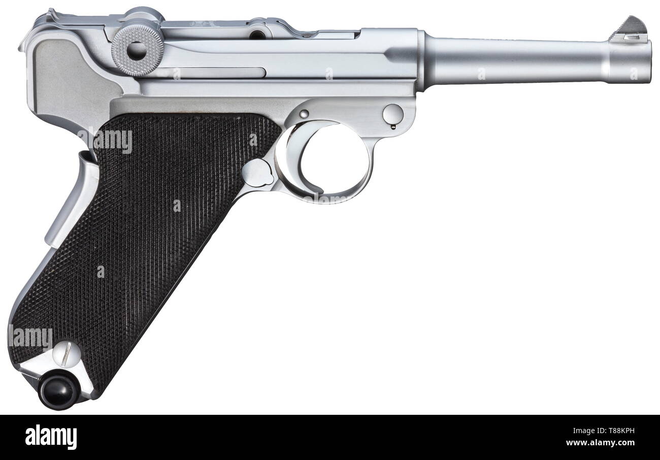 A Mauser Parabellum mod. 29/70, test weapon, matt chromed Cal. 9 mm Parabellum, no S/N and without proof mark. Mirror-like bore, length 100 mm. Extractor marked 'Loaded' and safety marked 'Safe'. Barrel stamped '9 mm Luger', on front link 'Original Mauser', on left side of frame 'MAUSER PARABELLUM', Mauser corporate name on front of grip. All parts except for firing pin completely matt chromed. Black plastic grip panels. Matt chromed sheet metal magazine with black base. Brand-new collectors´ item. After resuming their Parabellum manufacture at t, Additional-Rights-Clearance-Info-Not-Available Stock Photo