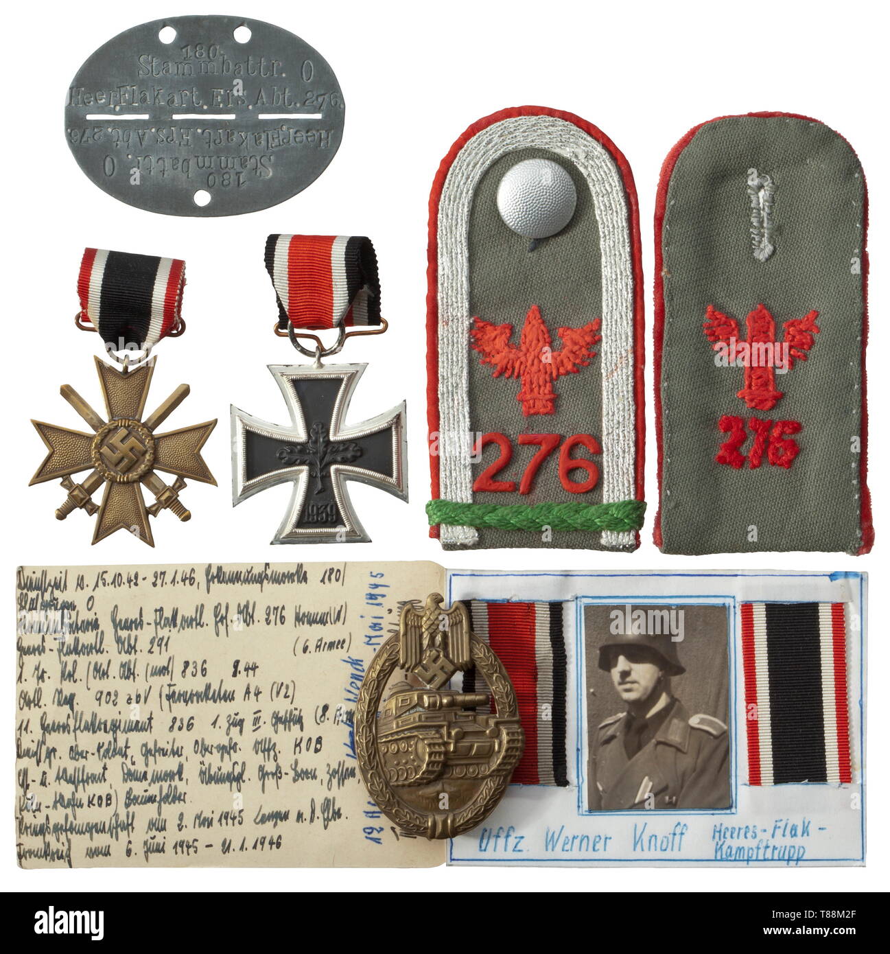 A grouping of Werner Knoff - 11th Company, Army Anti-Aircraft Regiment 836 A jacket for assault gun crews of grey-green woollen material. Slip-on shoulder boards for a non-commissioned officer, private wartime officer candidate lanyard (KOB). Red piping and hand embroidered grenade with '276' designation. Unit collar tabs on collar patches piped in red. Ribbon for the War Merit Cross 2nd Class, stitched-on Iron Cross 2nd Class ribbon, visible national eagle silhouette. The lower jacket shortened at the time and reinforced with additional material. Grey silk inner liner, no , Editorial-Use-Only Stock Photo