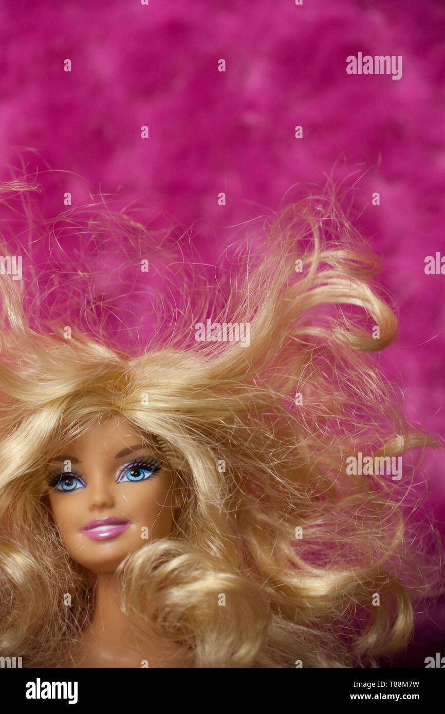 WOODBRIDGE, NEW JERSEY - May 10, 2019: A 2000s era Barbie Doll with messy  hair in front of a pink background Stock Photo - Alamy