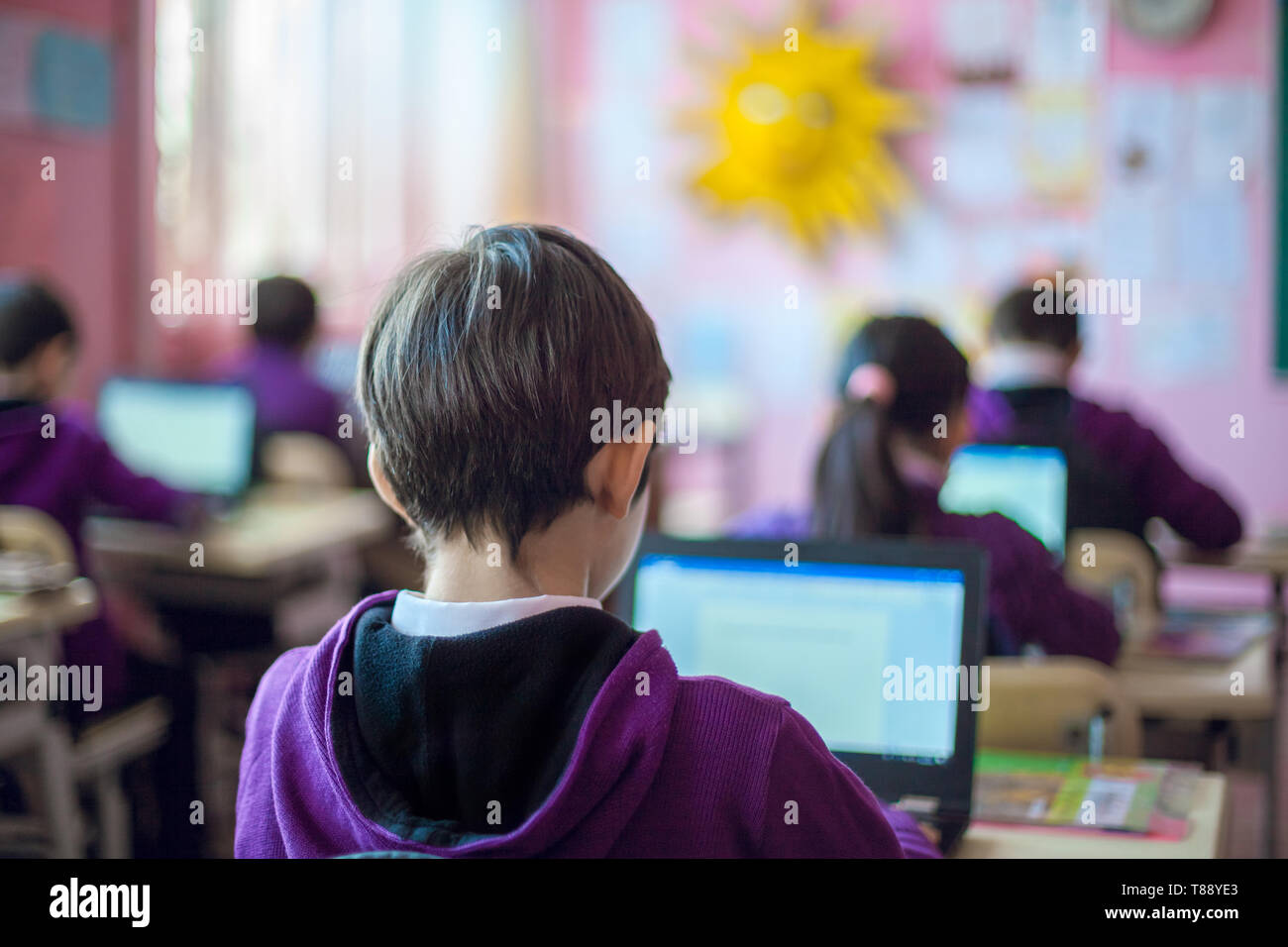 school children are participating actively in class Stock Photo