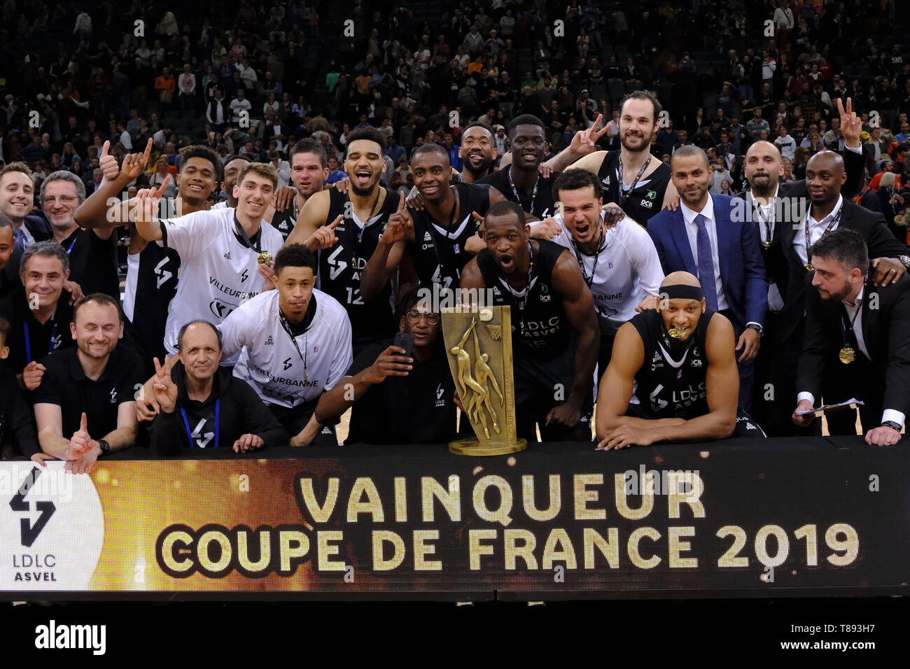 Paris, France. 11th May, 2019. Forward ASVEL CHARLES KAHUDI raises the  trophy for the winner of the French Basketball Cup at the AccorHotel Arena  in Paris - France.LDLC ASVEL won the French