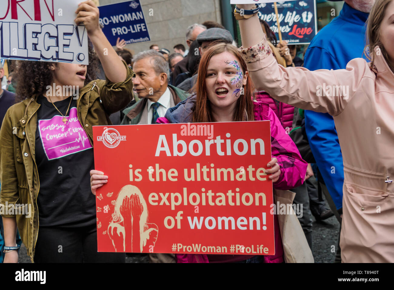 London, UK. 11th May 2019. The March for Life UK, a largely Catholic event, marches past pro-life protesters on Victoria St. Based on extreme right protests in the USA opposed to abortion they aim to raise awareness of the hurt and damage it causes and bring to an end what they call the greatest violation to human rights in history. Pro-choice opponents say they deny women basic rights, back harassment of women and oppose contraception, sex education and IVF fertility treatment. Peter Marshall/Alamy Live News Stock Photo