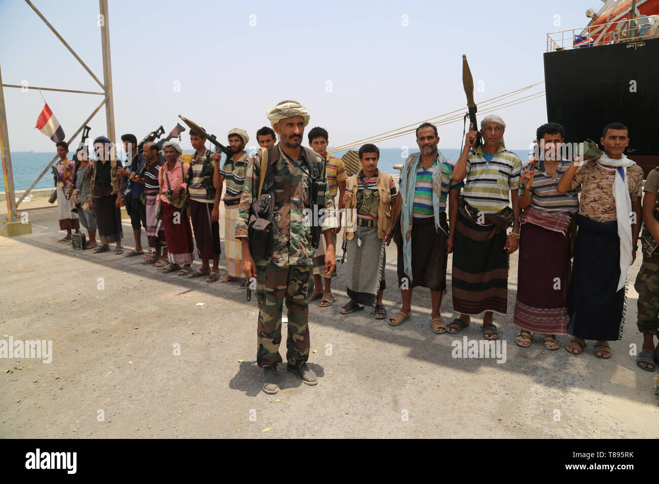 (190511) -- HODEIDAH (YEMEN), May 11, 2019 (Xinhua) -- Houthi members are seen during their withdrawal from Salif port in Hodeidah, Yemen, on May 11, 2019. Yemen's Houthi rebels began on Saturday withdrawal from two ports of Hodeidah Province, eyewitnesses said. (Xinhua) Stock Photo
