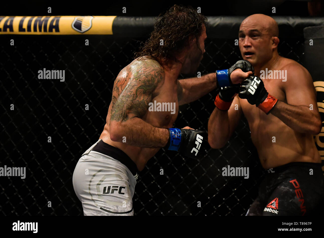 UFC 237: NAMAJUNAS vs. ANDRADE - Fighters BJPenn (red glove) and Clay Guida (blue glove) during UFC 237 preliminary card fight at Jeunesse Arena, Rio de Janeiro . Photo: Thiago Ribeiro / AGIF Stock Photo