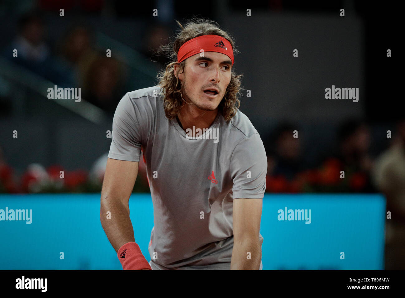 Stefanos Tsitsipas from Greece during the Mutua Madrid Open Masters match  against Rafael Nadal from Spain on day eight at Caja Magica in Madrid,  Spain. Stefanos Tsitsipas beat Rafael Nadal Stock Photo -
